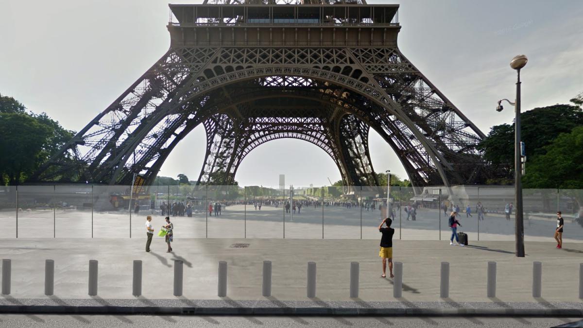 A protective barrier integrated into the historic site The Eiffel Tower